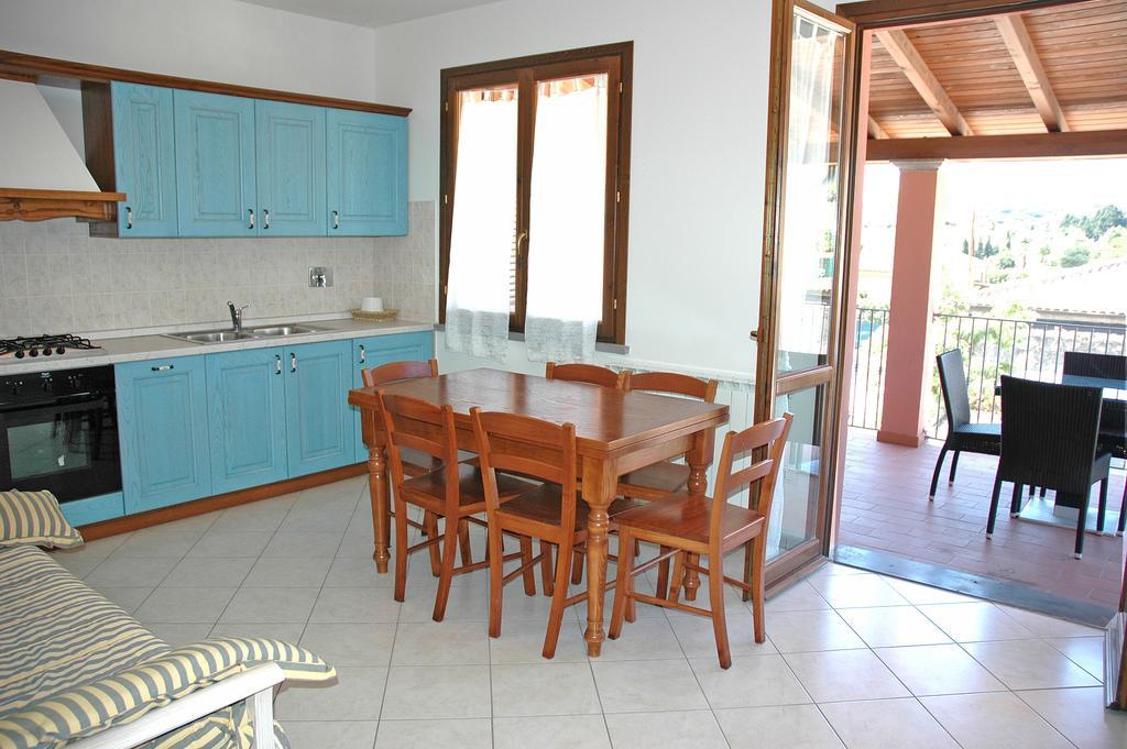 Appartamento Baia Fiorita Porto Azzurro Camera foto